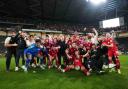 Crawley Town celebrate after their win at MK Dons