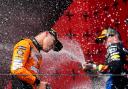 Max Verstappen (right) and Lando Norris celebrate after the race (David Davies/PA)