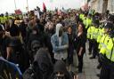 Police and protesters at Brighton in April