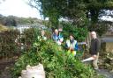 Green-fingered residents with the fruits of their labour