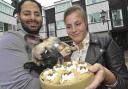 Joel Ariaman and Alex Ziembinska are to open a dog cafe in Brighton Square this week. Their French bulldog Bonnie tucks into some celebratory treats