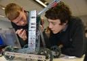 Kyle Kneller (left) and Max Gilbert constructing robots Picture: Terry Applin