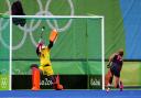Maddie Hinch saves a penalty from Maartje Paumen during the final