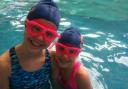 Abigail Craig, 10, and her eight-year-old sister Samara swam the equivalent of the English Channel for charity