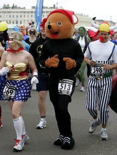 THEY might not have been able to
fly faster than a speeding bullet but
about 1,500 superheroes were more
than capable of handling a 10km
run along the seafront.
Capes were fluttering, plenty of
Lycra was on show and there was face
paint aplenty as 