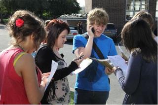 Uckfield Community Technology College students with their results.
