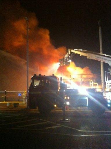Hastings Pier has been all but destroyed by a savage blaze which broke out in the early hours of Tuesday, October 5. 
The blaze started at the pier ballroom, which closed in June 2006, but fire crews said it has spread with up to 90% of the structure ali