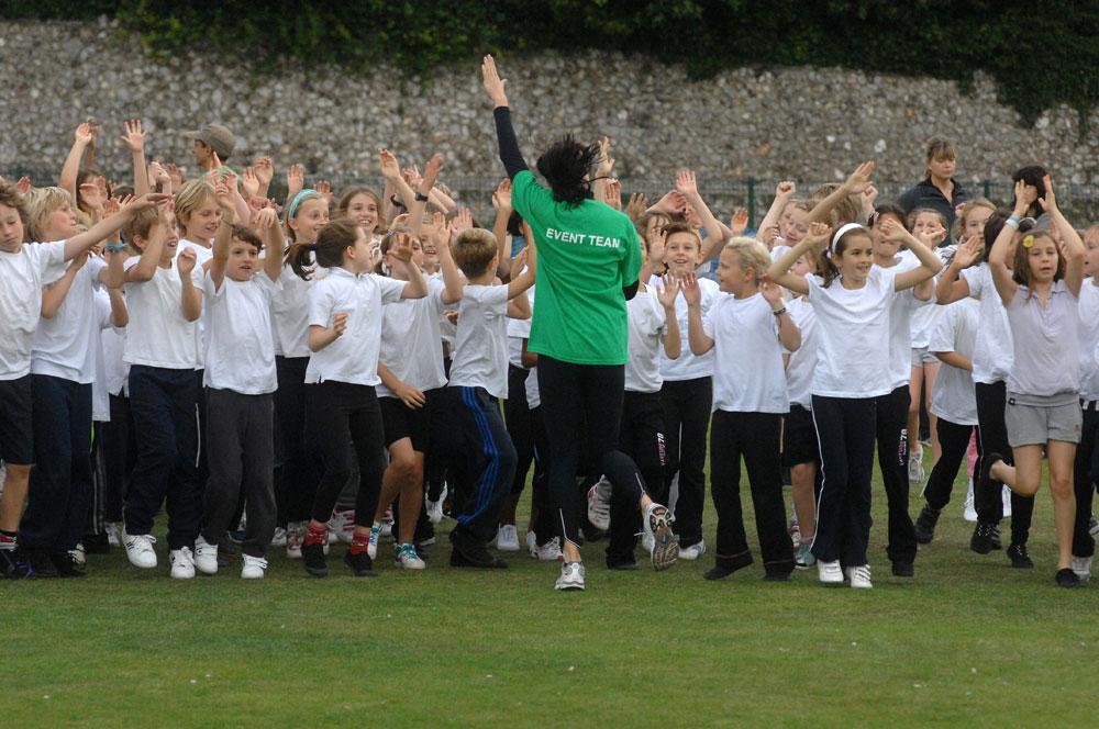 Balfour School pupils warming up at Run the World Preston Park.