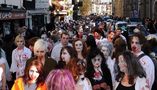 Thousands of zombies made their way through Brighton city centre for the annual Beach of the Dead walk.