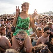 Partygoers enjoying On The Beach in Brighton. Credit: Mike Burnell