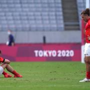 Great Britain's Alex Davis (left) and Dan Bibby appear dejected after defeat in the Men's Rugby Seven Bronze Medal match at the Tokyo Stadium