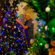 Geoff Stonebanks decorating one of his many trees