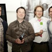 Alan Lugton (second from left) receiving an Eco Award. Photo by Sam Eddison.