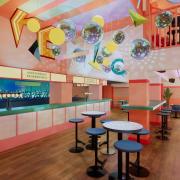 The new refurbishment takes inspiration from 1980s Miami with neon hues and bright colours