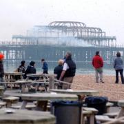 Residents and visitors looked on helplessly as the pier burned