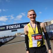 Brighton Marathon: Winner crosses the line