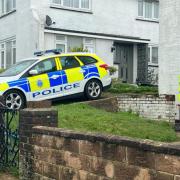 Police in Cowley Drive in Woodingdean on Thursday