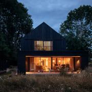 The 'striking' Black Timber House in Rodmell near Lewes has won two architecture awards