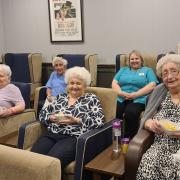 Heather View residents enjoying the in house cinema
