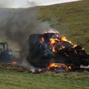 Updates as road closed due to tractor fire near rural beauty spot