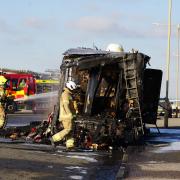 Fire crews fought to extinguish a carvan fire along Seaford seafront