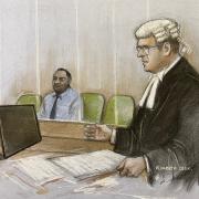 A court sketch of Mark Gordon looking at Tom Little KC