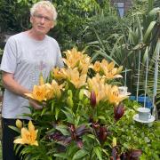 Geoff with a lovely display of lilies