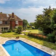 The home has an outdoor heated swimming pool