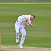 Ollie Robison bowling for Sussex as they push for the win over Gloucestershire
