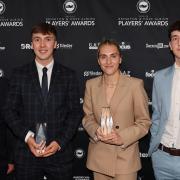 Jack Hinshelwood, second from left, and Maisie Symonds with their young player of the year awards