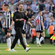 Roberto De Zerbi applauds Albion's fans after the draw at Newcastle