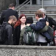 Gavin Pidwell and Jessica Nero with friends outside Brighton Magistrates' Court