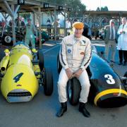 Dr Michael “Spike” Milligan with classic racing cars
