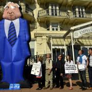 Fat cat protest held outside The Grand
