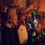 Christoph Waltz hears a tiger's tale from David Thewlis in The Zero Theorem...