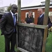 Sam Gyimah MP, left, at TinySaurus Nursery in Hove with area manager Nicole Coulson and councillor Graham Cox. Picture by Tony Wood