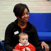 A baby group funded through the children's centres budget held at Moulsecoomb Library. Picture by Simon Dack