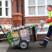 Street cleaner Mark Cosham working in Hove