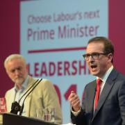 Jeremy Corbyn watches Owen Smith speak during a Labour Leadership debate
