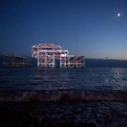 The West Pier was lit up last night to celebrate its 150th anniversary.  Picture: Terry Applin