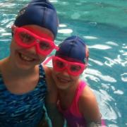 Abigail Craig, 10, and her eight-year-old sister Samara swam the equivalent of the English Channel for charity