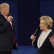 Republican presidential nominee Donald Trump and Democratic presidential nominee Hillary Clinton speak during the second presidential debate.  Picture: Patrick Semansky/AP