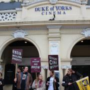 Works on the picket line at the Duke of Yorkâs cinema in Preston Road