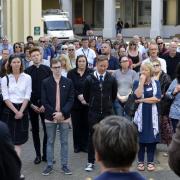 One minute silence vigil outside Brighton Town Hall and Hove Town Hall..Councillors, staff and residents meet outside Brighton Town Hall for a one minute silence to remember all those killed or injured in Manchester and elsewhere in the world in similar