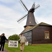 Polling clerk Carol Fairey and Friends of West Blatchington Windmill Peter Hill prepare to open a polling station    Picture: Simon Dack