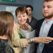 Caroline Lucas of the Green Party celebrates victory in Brighton Pavilion with family and friends at the counts.  Picture: Simon Dack