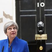 Theresa May addresses the country in Downing Street yesterday, promising Brexit negotiations would go ahead as planned.  Picture: Jonathan Brady/PA Wire.