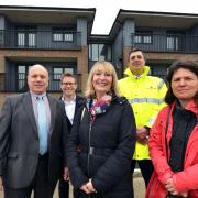 Cllr Ron Maskell; Leighton Rowe, development project manager at LDC; Cllr Elayne Merry; James Maude from Thakeham Client; Cllr Olivia Honeyman outside some of the completed homes