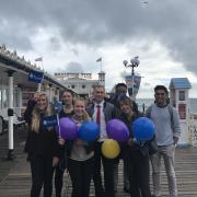 Brighton Onecom staff help raise £2,000 for MIND