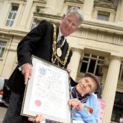FREEMAN: Henry Allingham gets the freedom of the City of Brighton and Hove from Mayor Garry Peltzer Dunn outside Brighton Town Hall